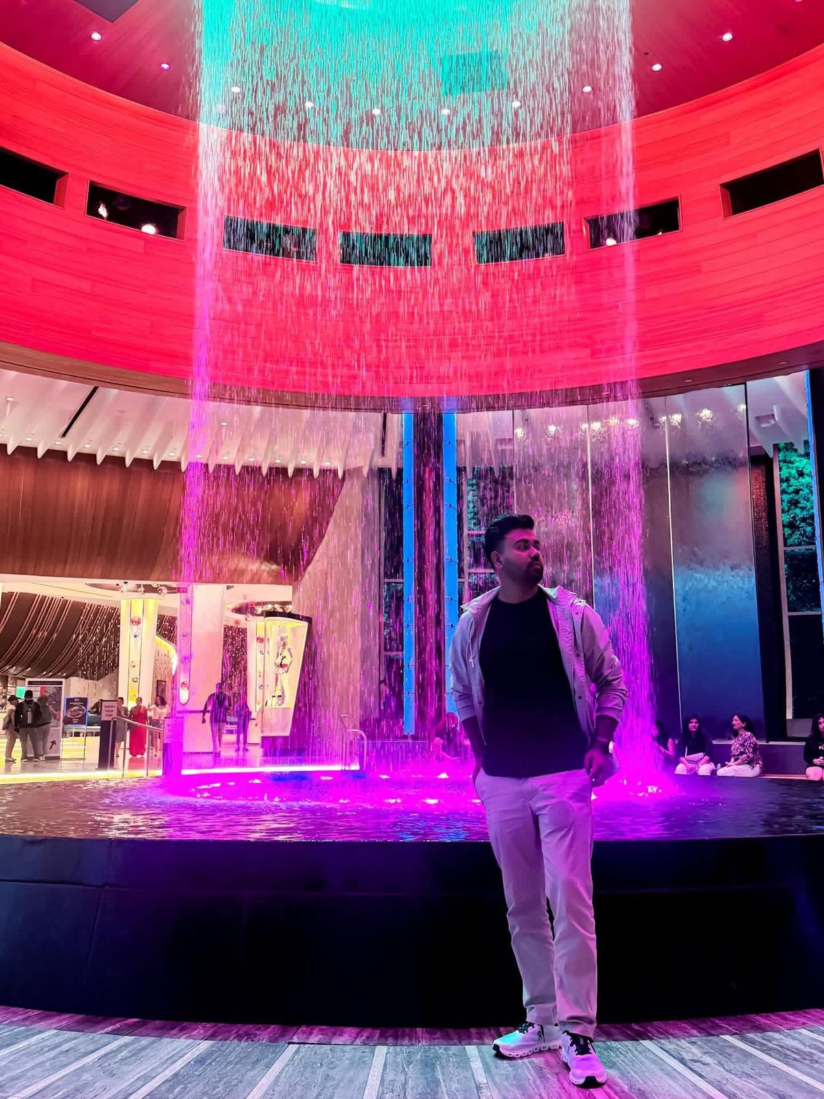Toukir Islam at an indoor waterfall in Florida